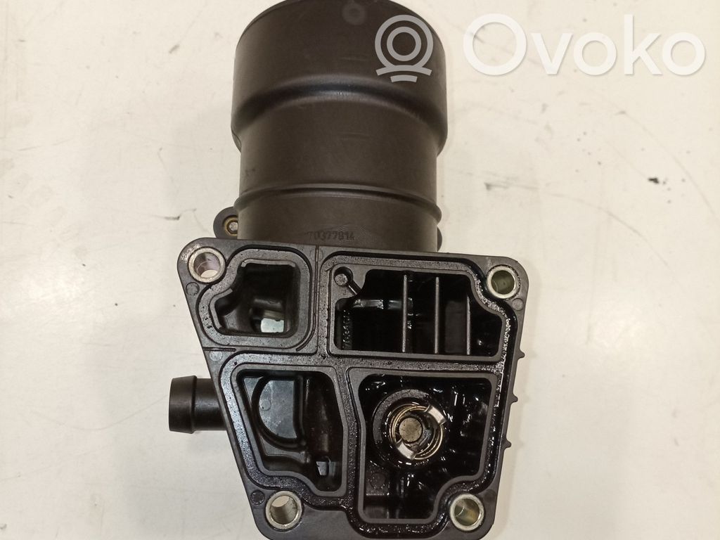 Engine oil radiator   03L115389C