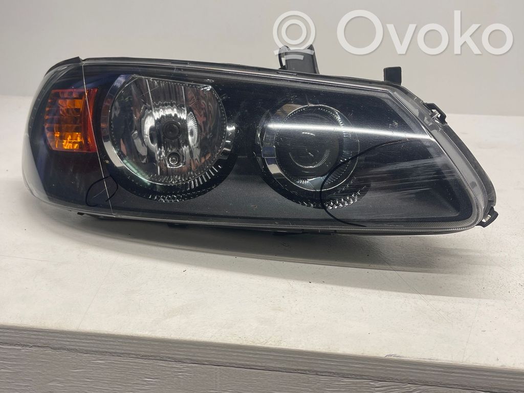 Nissan Almera N16 Lampa przednia 