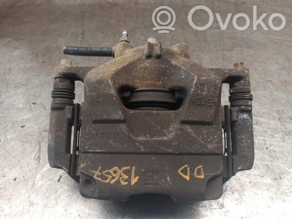Opel Astra G Zacisk hamulcowy przedni 