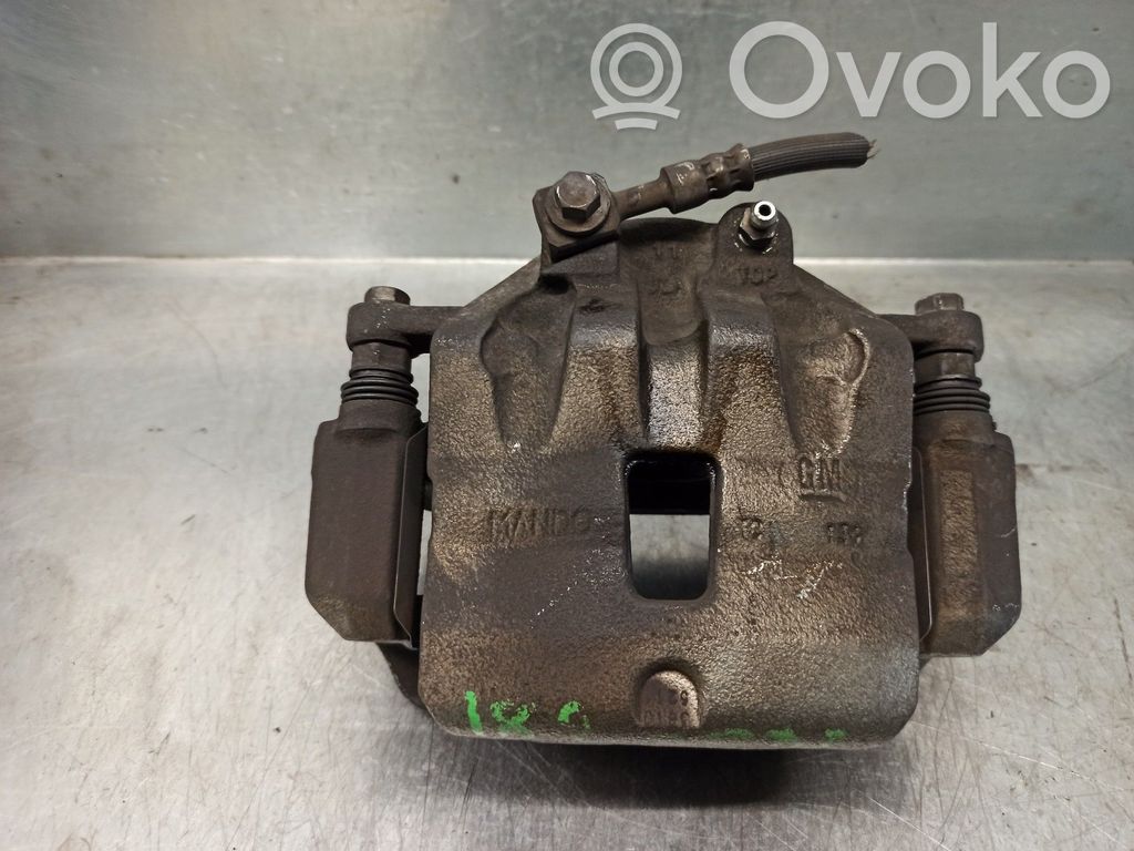Opel Insignia A Zacisk hamulcowy przedni 