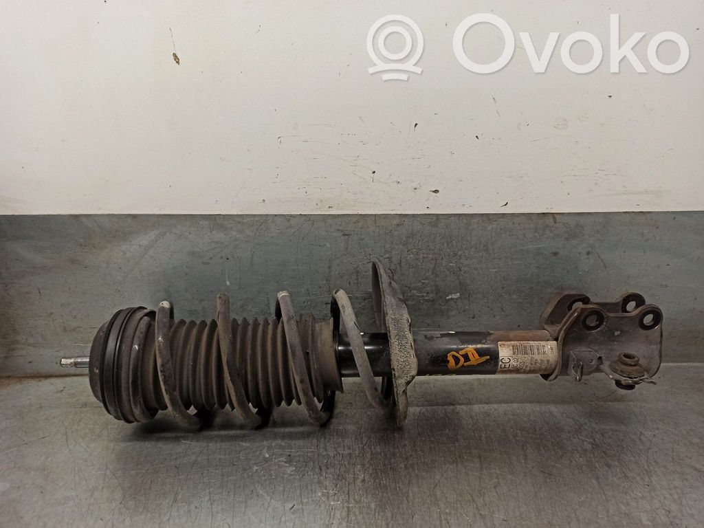 Opel Corsa D Amortyzator osi przedniej ze sprężyną 