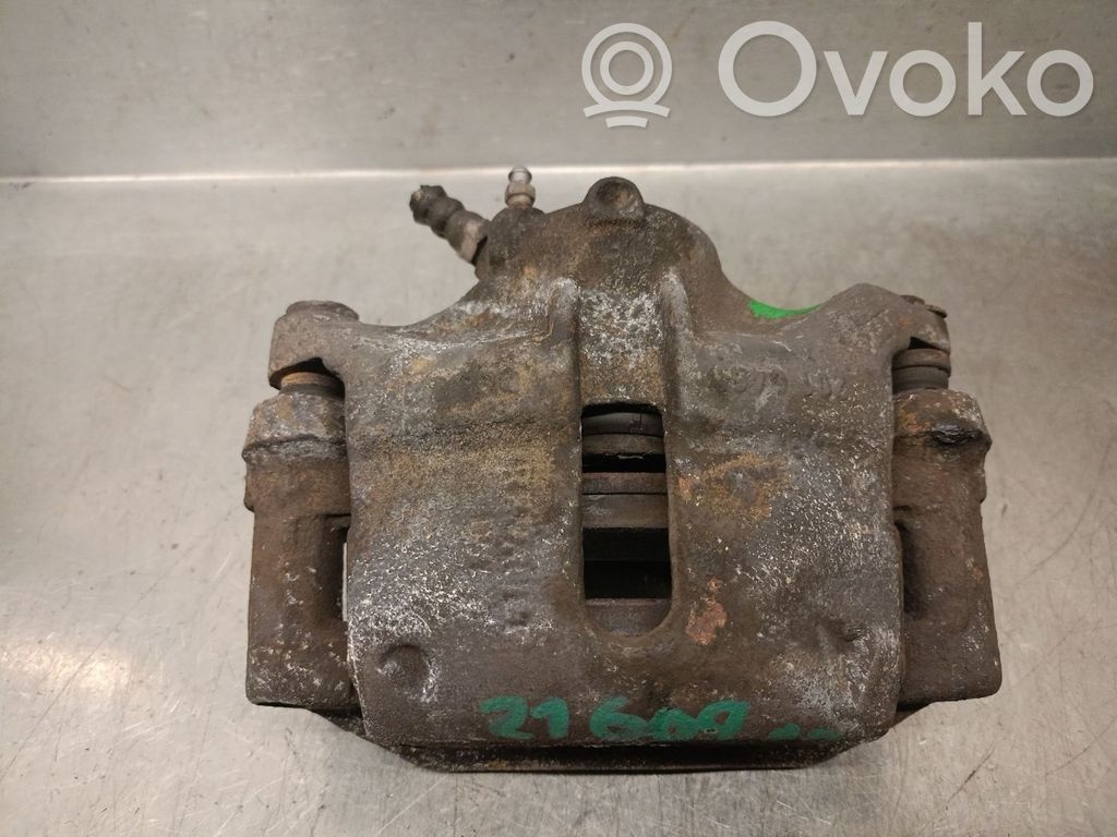 Nissan Kubistar Передний суппорт 