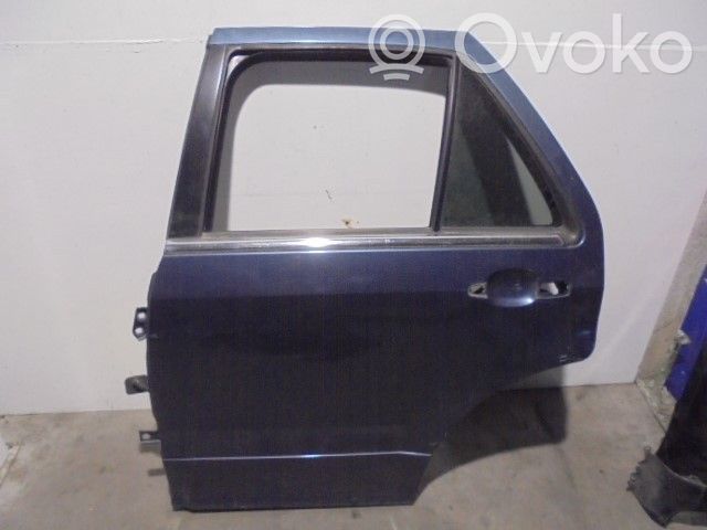 Cadillac SRX Rear door 