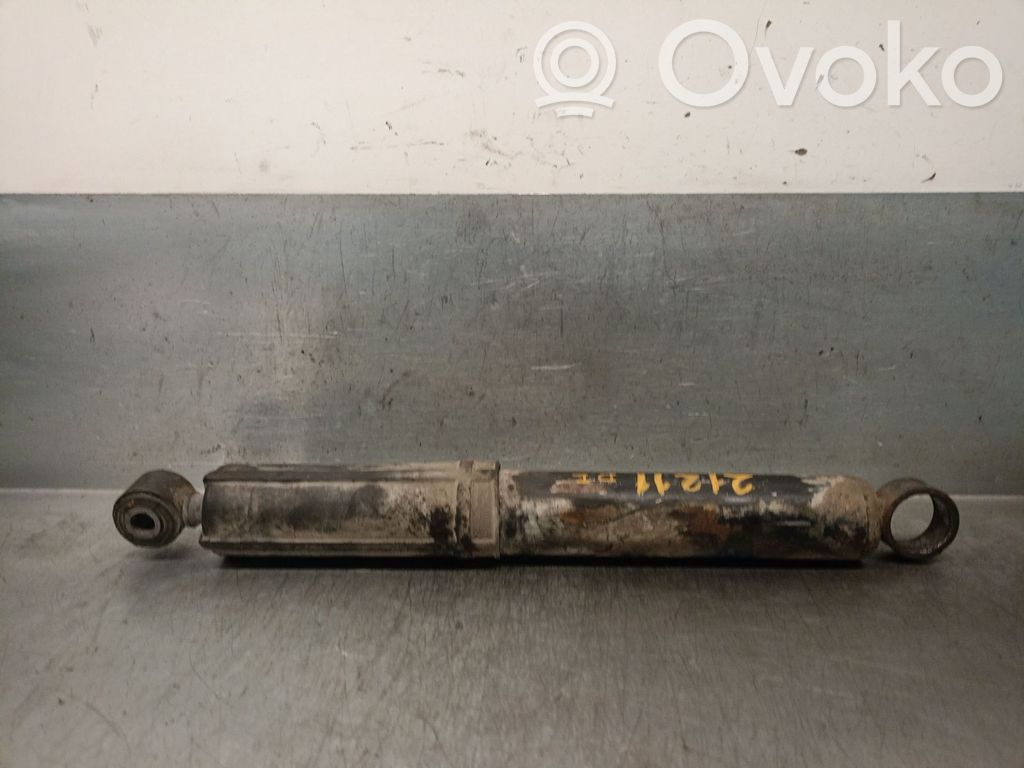 Nissan Interstar Amortiguador delantero con muelle espiral 