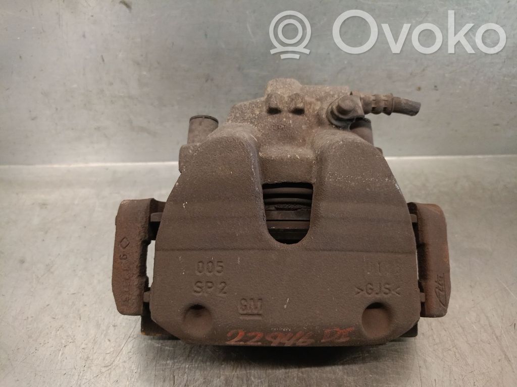 Opel Corsa E Zacisk hamulcowy przedni 