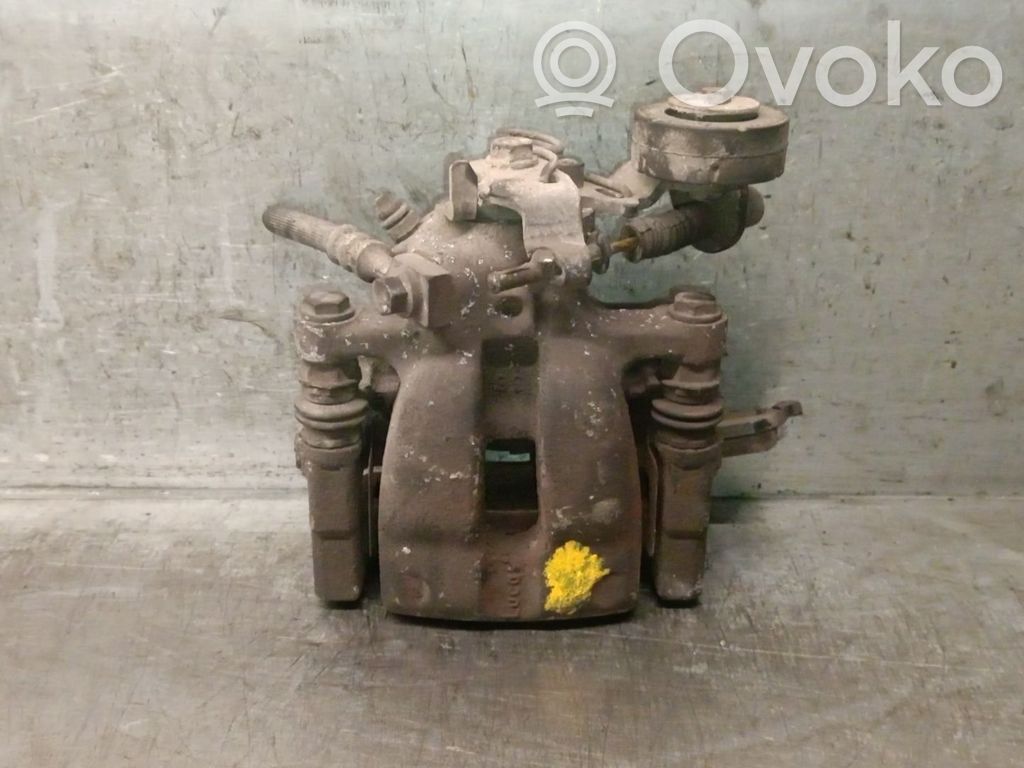 Opel Astra G Tylny zacisk hamulcowy 