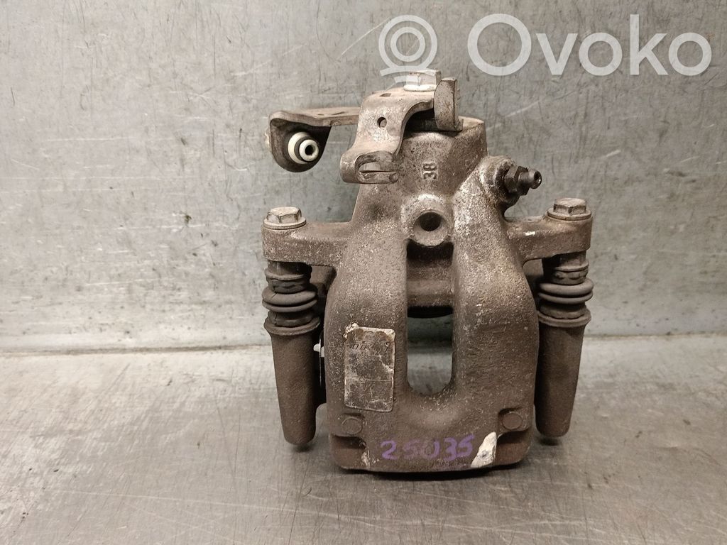 Citroen C4 I Mocowanie / Zacisk hamulca tylnego 