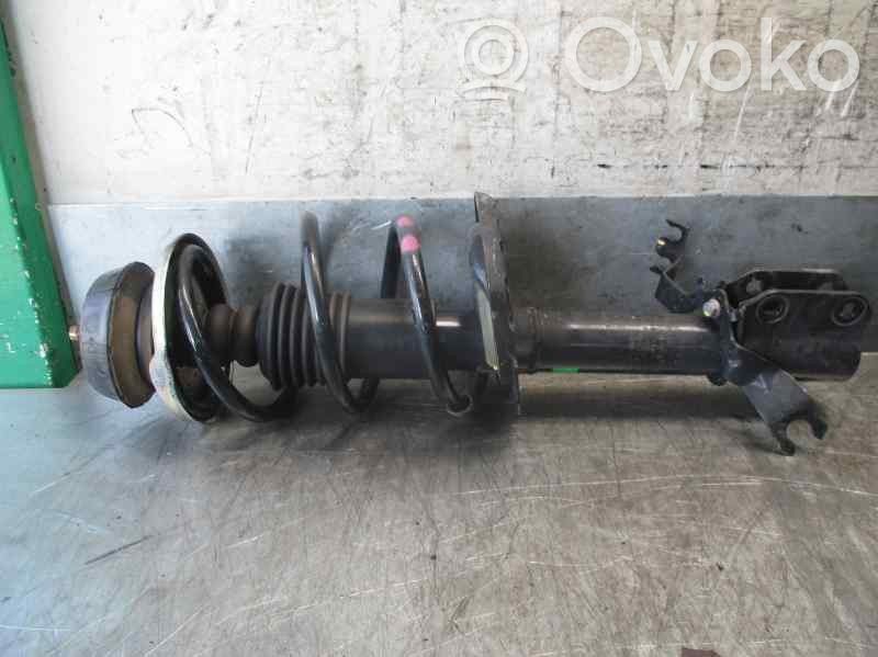 Dacia Sandero II Front shock absorber with coil spring 