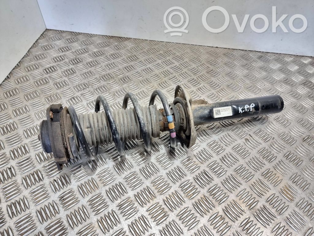 Volkswagen Golf VI Amortyzator osi przedniej ze sprężyną 