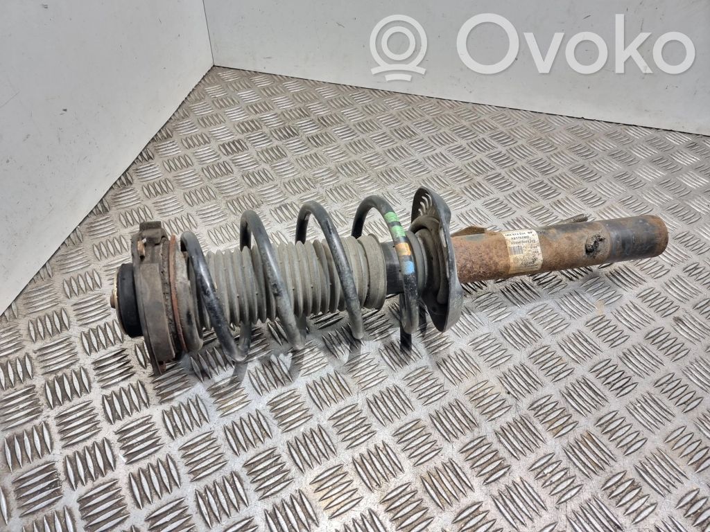 Volkswagen Golf VI Amortyzator osi przedniej ze sprężyną 