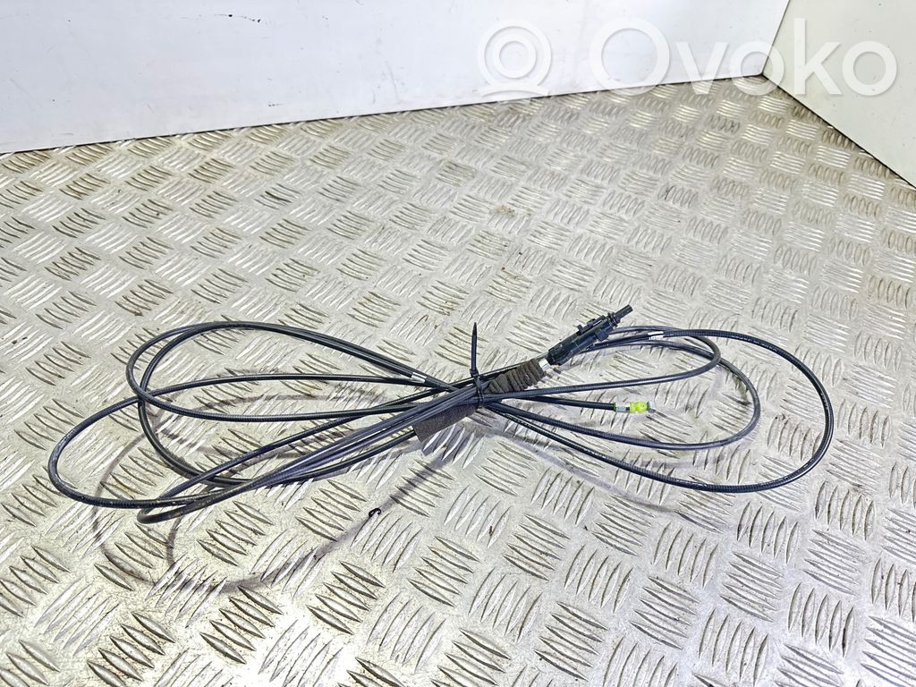 Fuel cap flap release cable