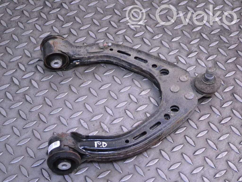 Front upper control arm/wishbone   104396600B