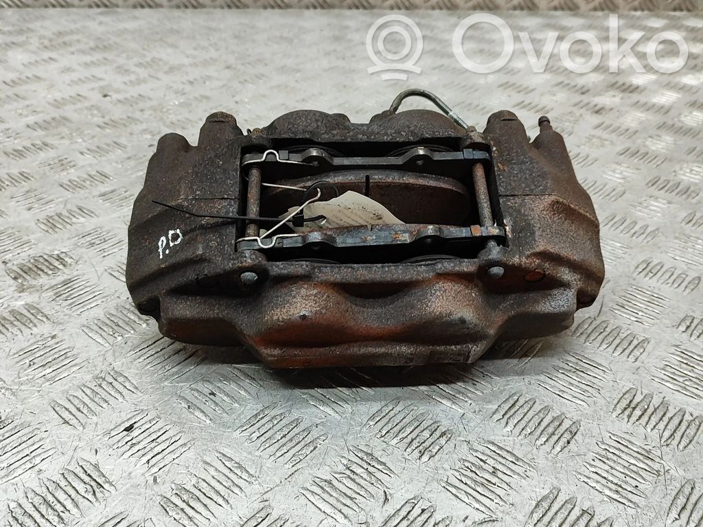 Toyota Land Cruiser (J120) Zacisk hamulcowy przedni 