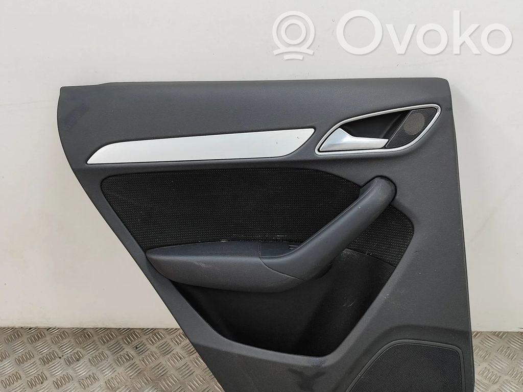Audi Q3 8U Takaoven verhoilu 