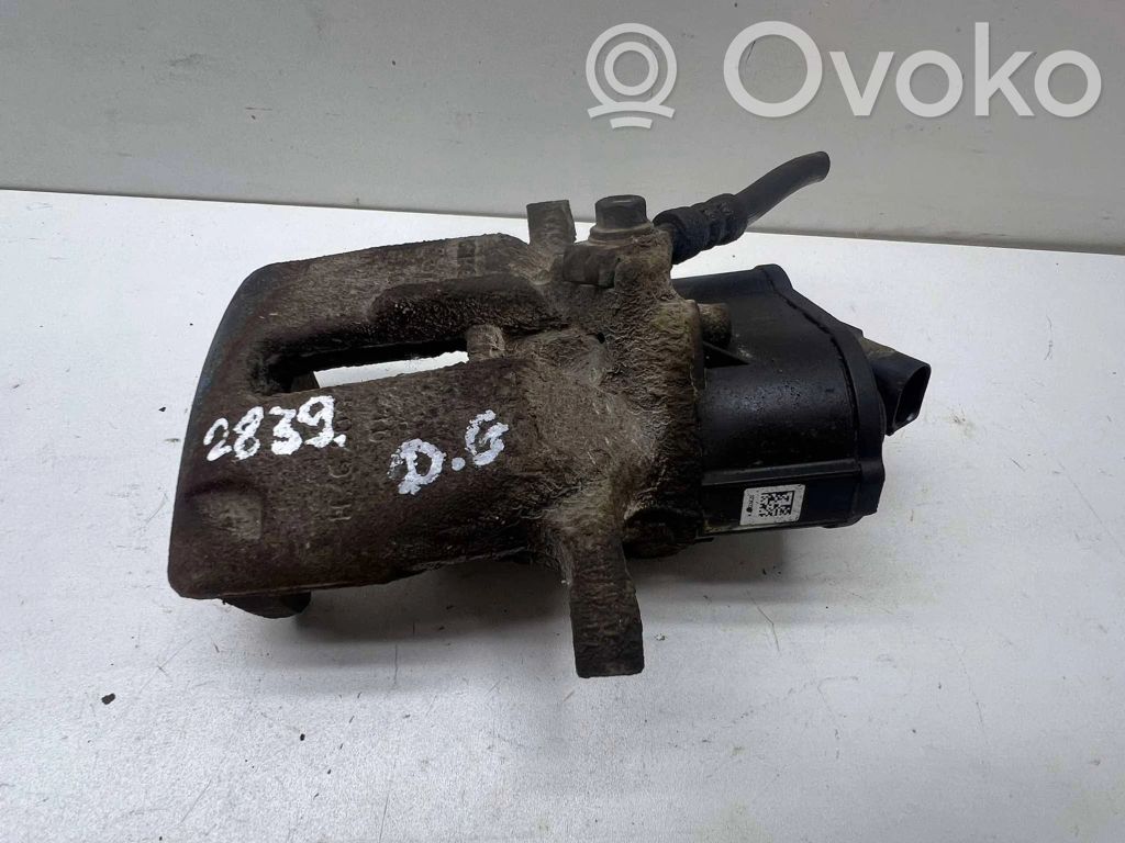 Volkswagen PASSAT B7 Tylny zacisk hamulcowy 