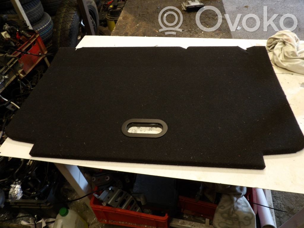 Trunk bottom trim panel