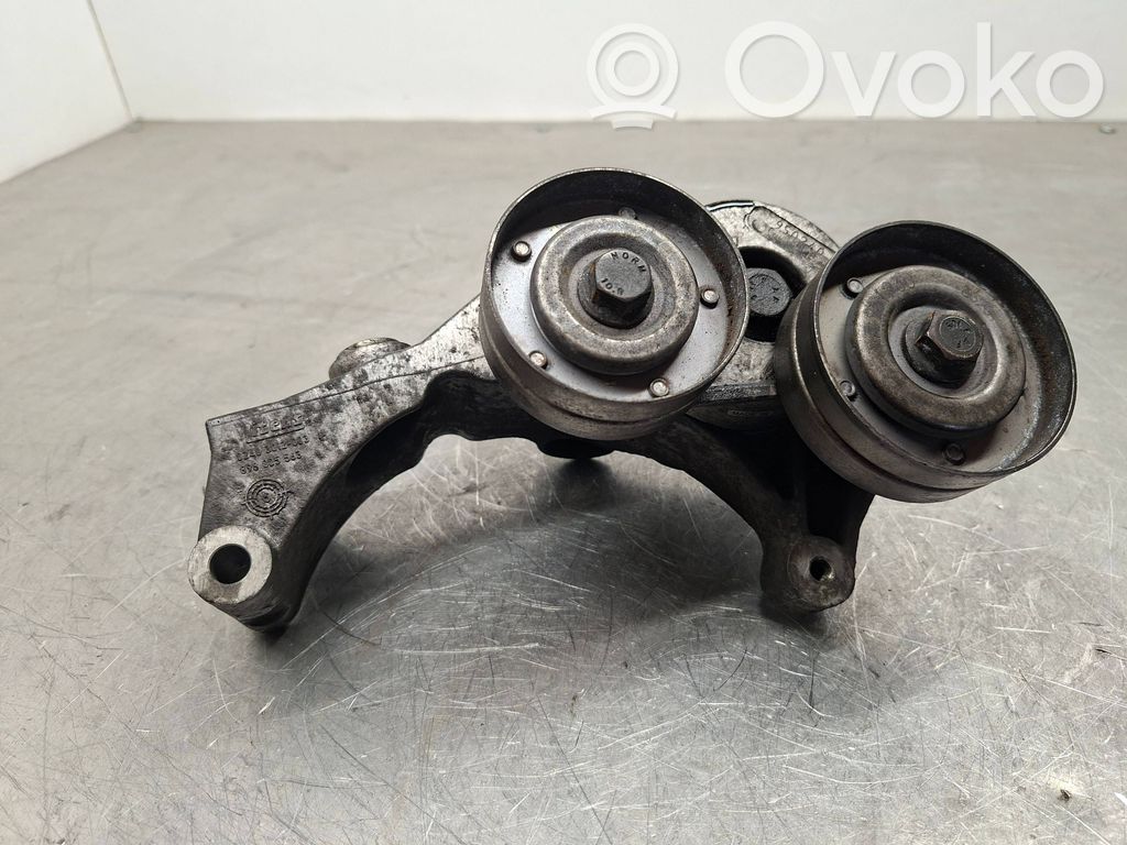 Opel Astra H Generator/alternator belt tensioner 