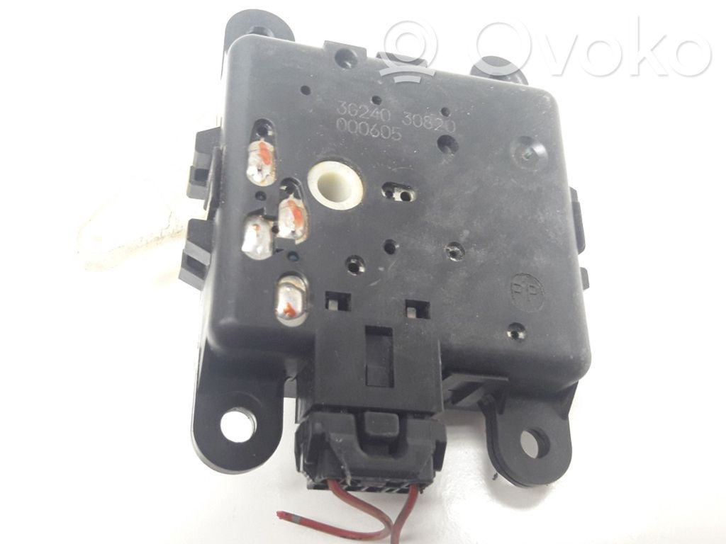 Nissan Almera N16 Motor/activador trampilla de calefacción 