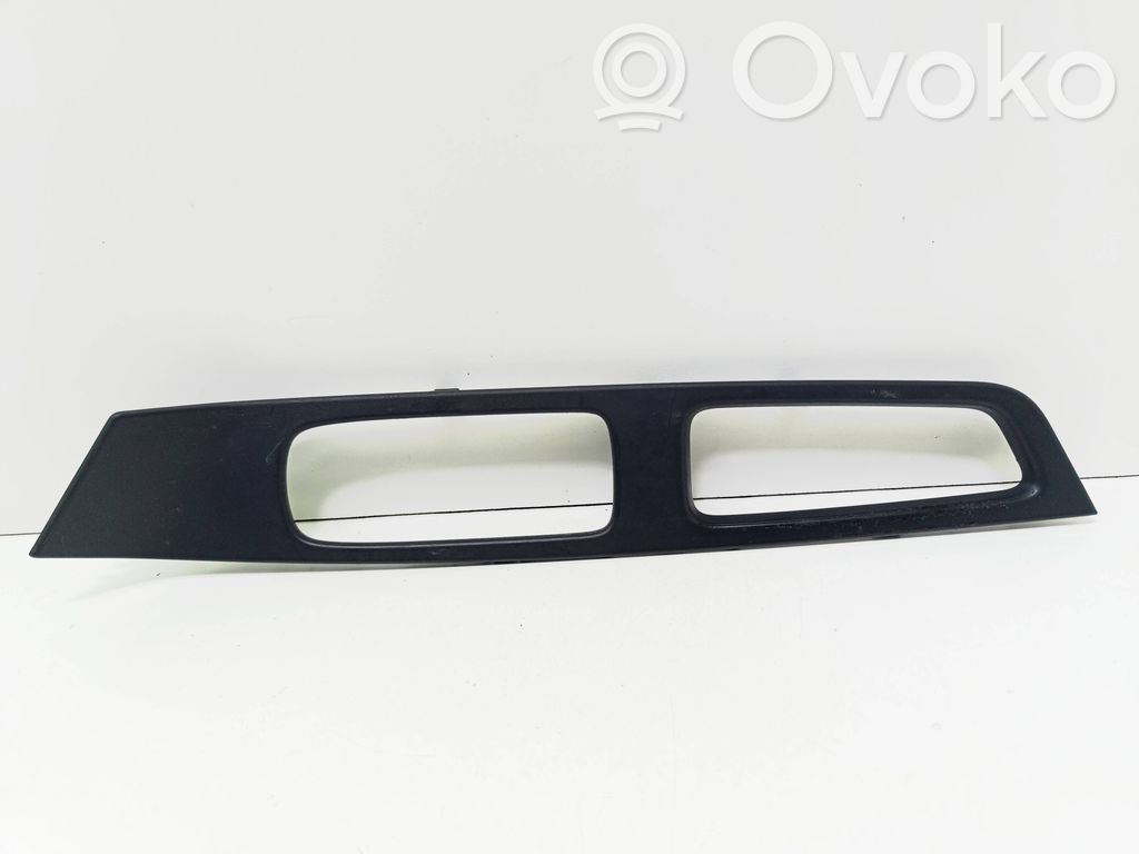 Volvo V60 Front door window switch trim