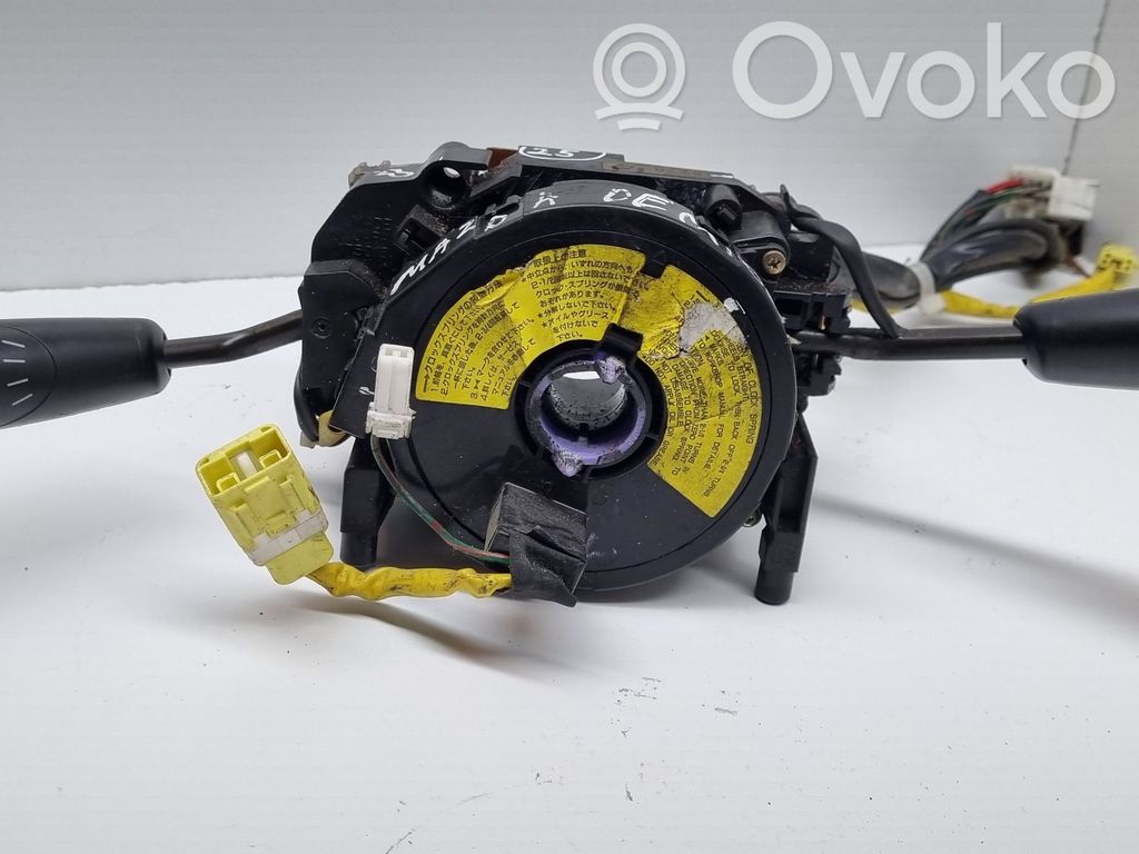 Mazda Demio Commodo, commande essuie-glace/phare 