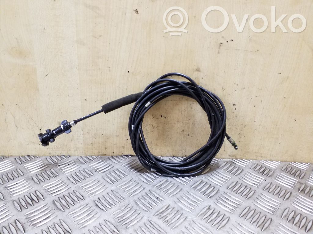 Fuel cap flap release cable