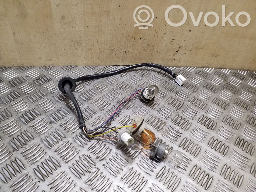 Chevrolet Captiva Takavalon polttimon suojan pidike 