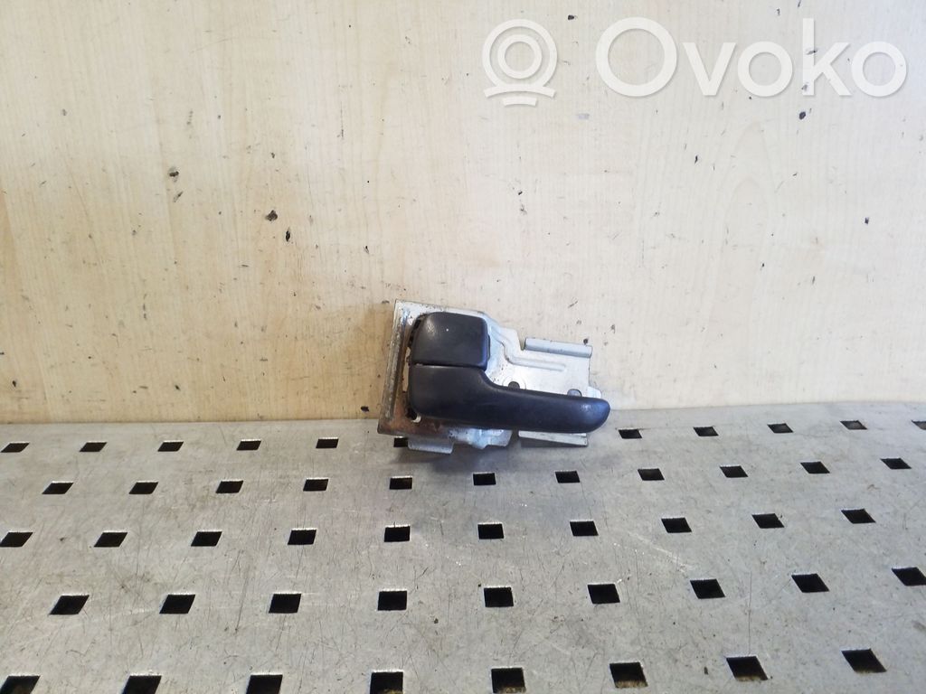 Mazda 323 F Rear door interior handle 