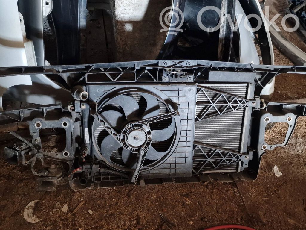Bottom radiator support slam panel