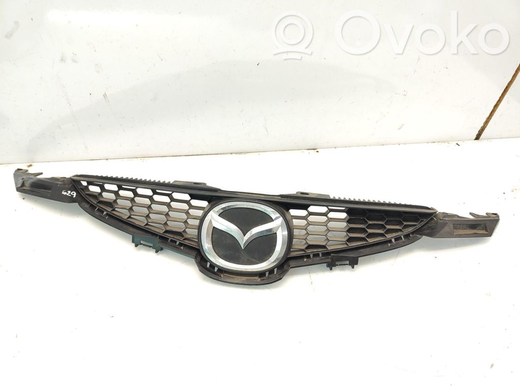 Mazda 2 Front bumper upper radiator grill 