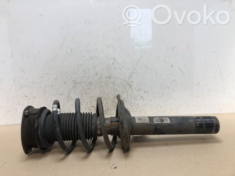 Volkswagen Cross Touran II Amortyzator osi przedniej ze sprężyną 