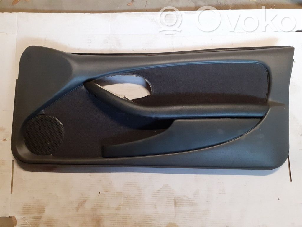 Front door card panel trim