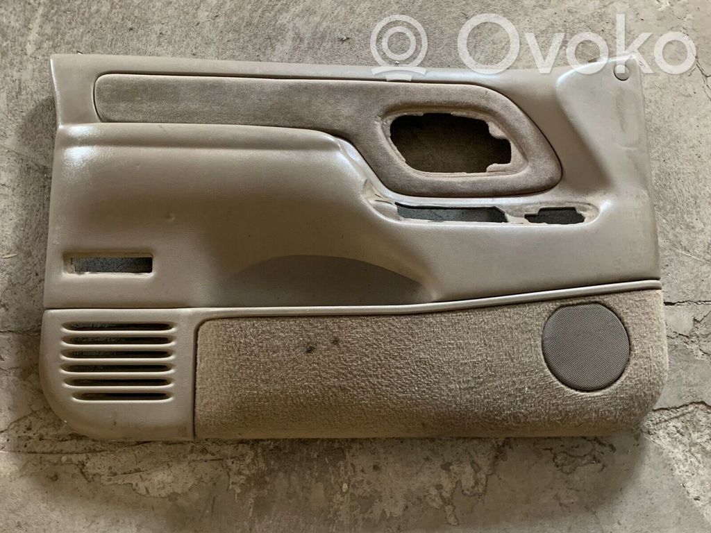 Front door card panel trim