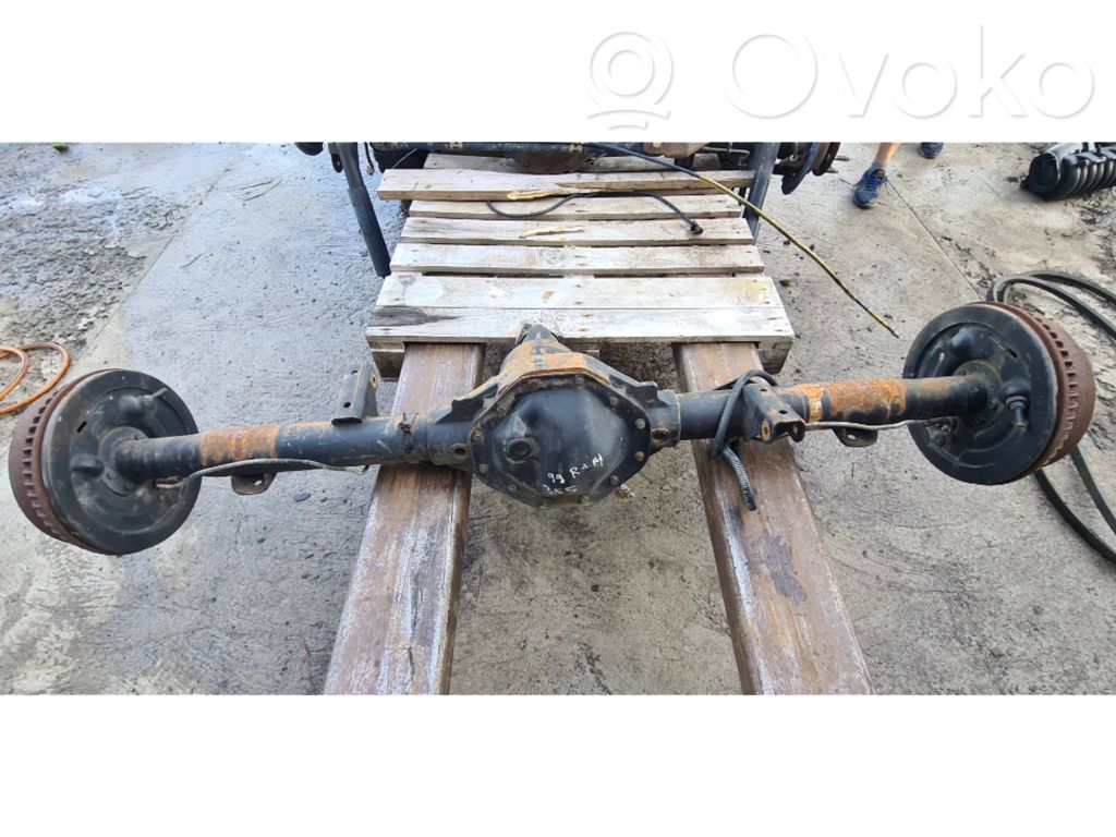 Rear axle beam with reductor