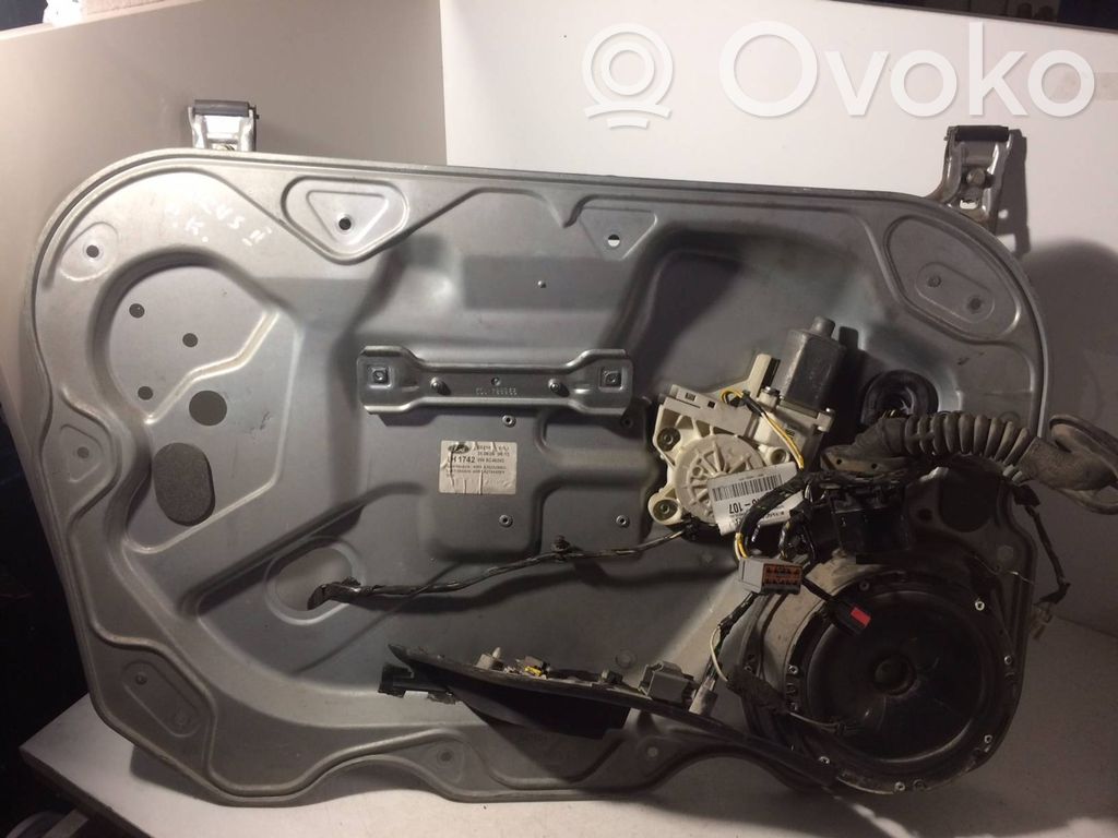 Ford Focus Regulador de puerta delantera con motor 