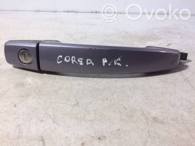 Opel Corsa D Klamka zewnętrzna drzwi przednich 