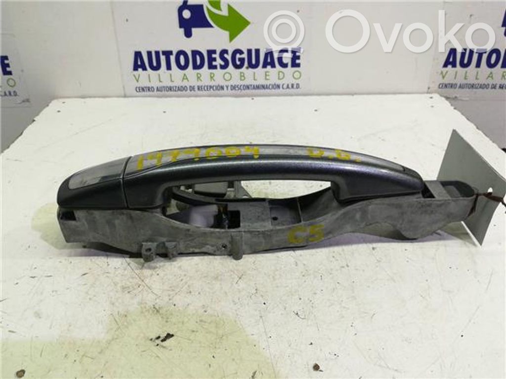 Manecilla externa puerta delantera