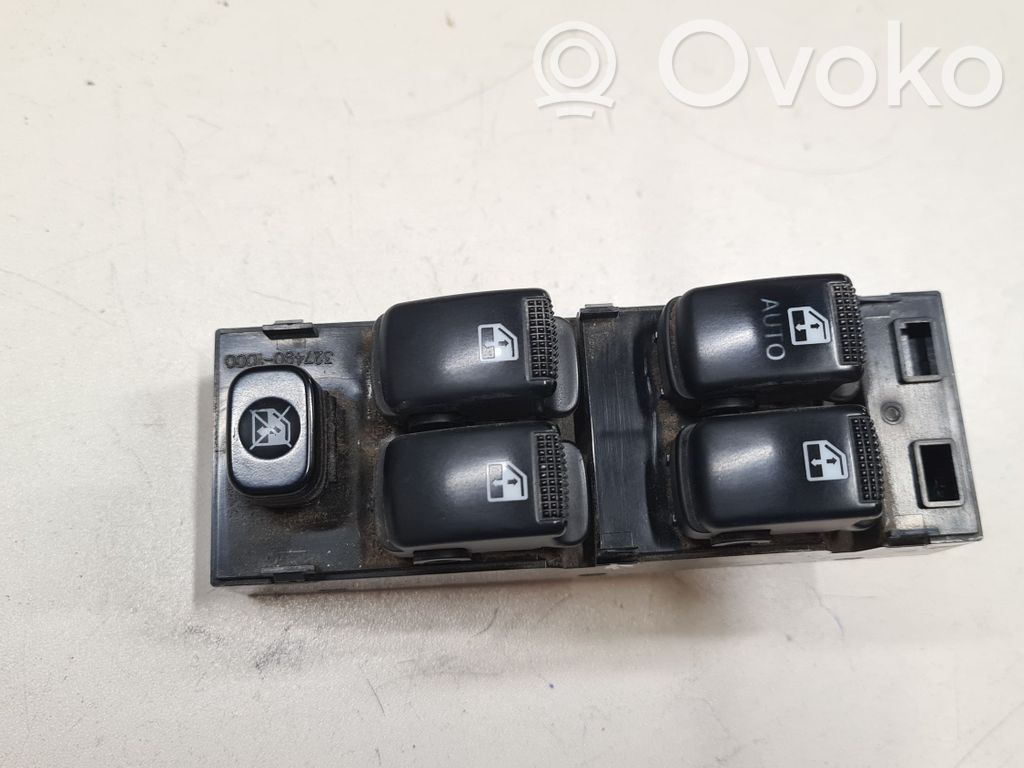 KIA Carens I Electric window control switch 