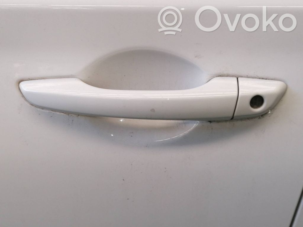Manecilla externa puerta delantera