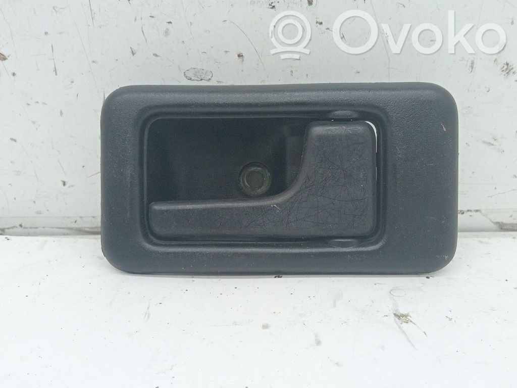 Manecilla interna puerta delantera
