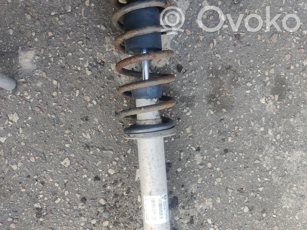 BMW 5 E60 E61 Takaiskunvaimennin kierrejousella 