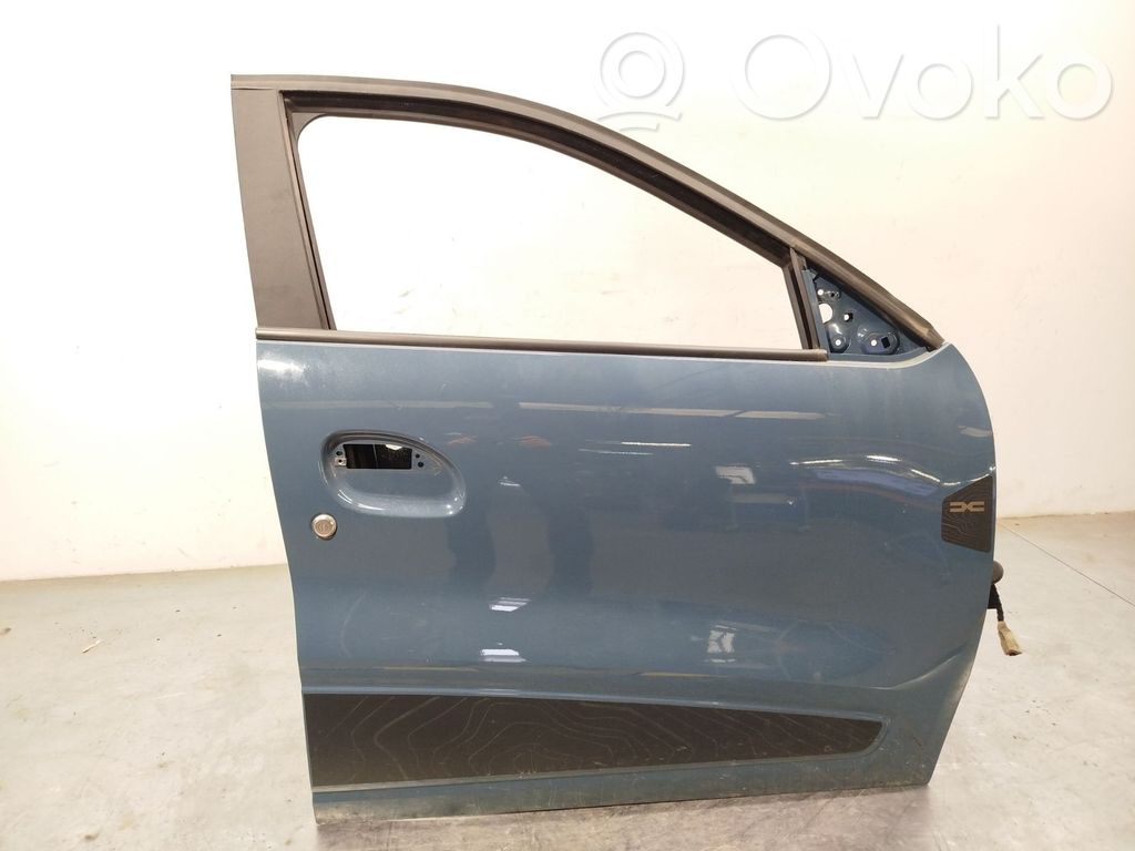 Dacia Spring Durvis 