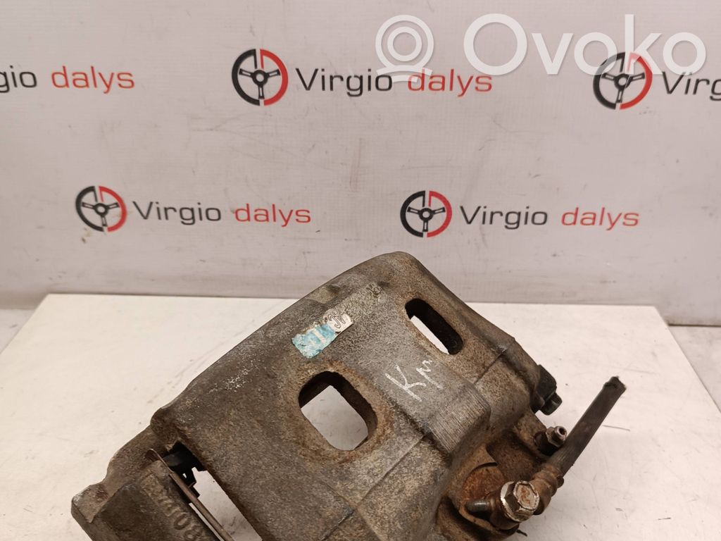 Front brake caliper   AB312B135