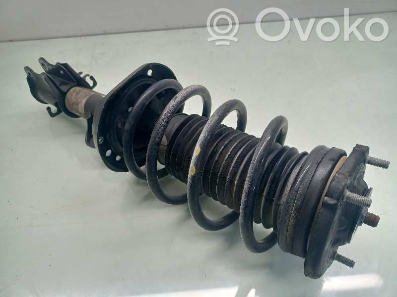 Opel Combo D Front shock absorber with coil spring 