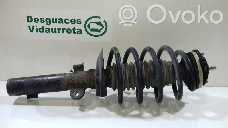 Front shock absorber with coil spring