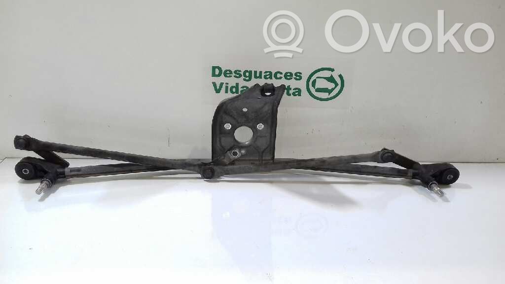 Front wiper blade arm