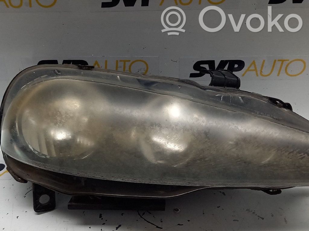 Headlight/headlamp   89101233DX,AMARELADA