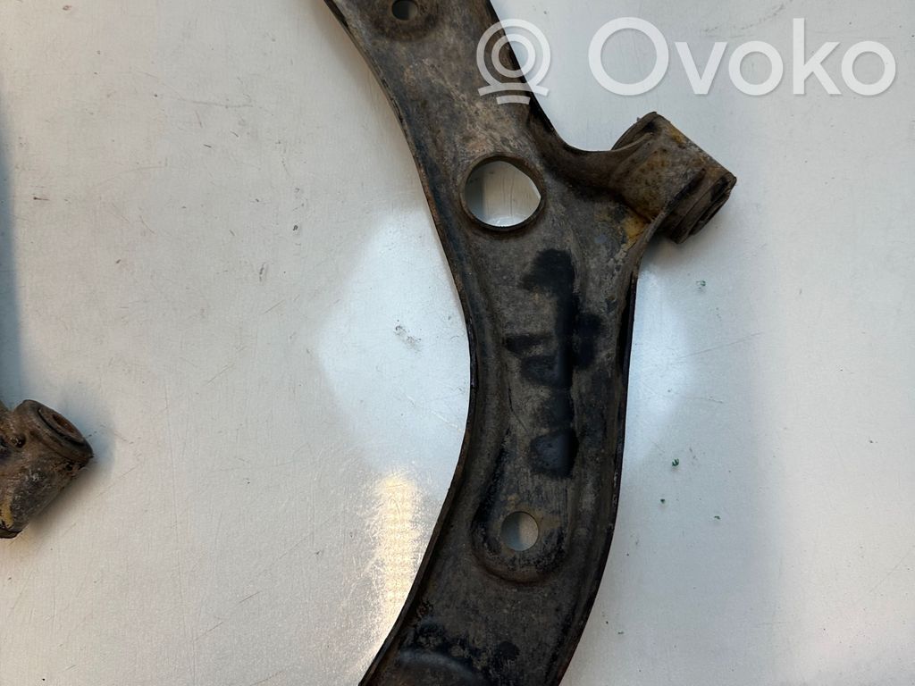Suzuki Swift I Front control arm 