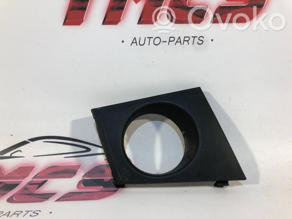 Renault Megane II Moldura/rejilla de la luz antiniebla delantera 