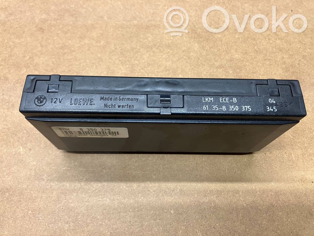 BMW 5 E34 Komforto modulis 