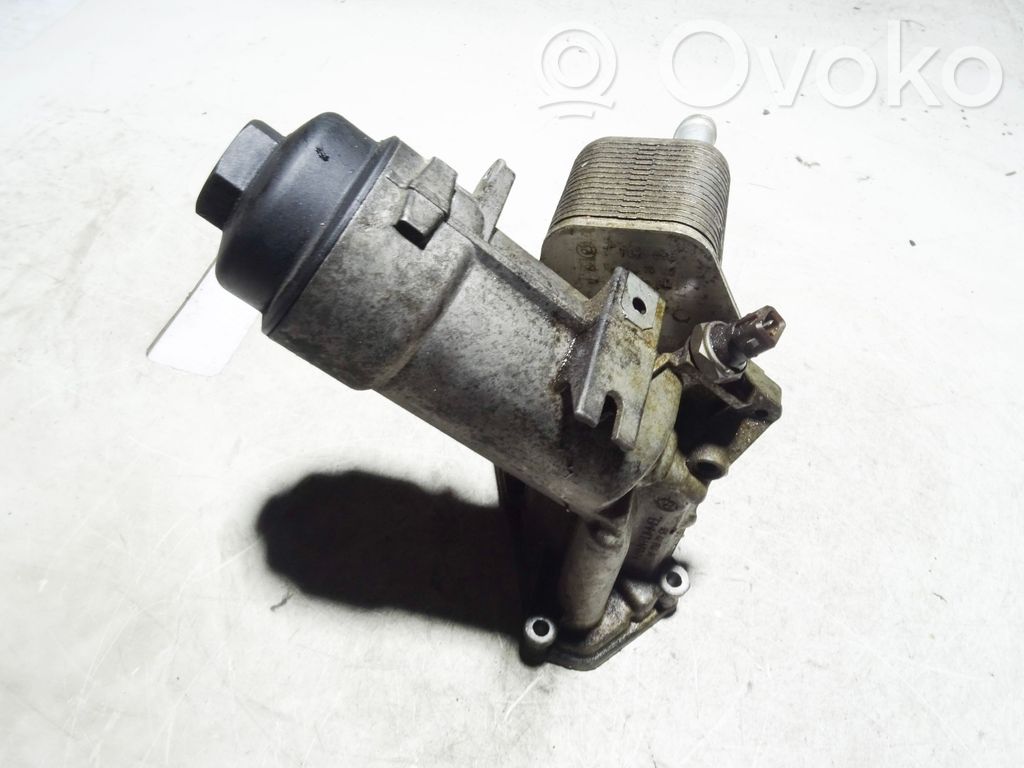 Oil filter mounting bracket   7787698,778707206